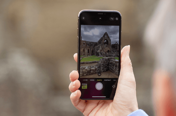 Tintern Abbey being photographed on an iPhone