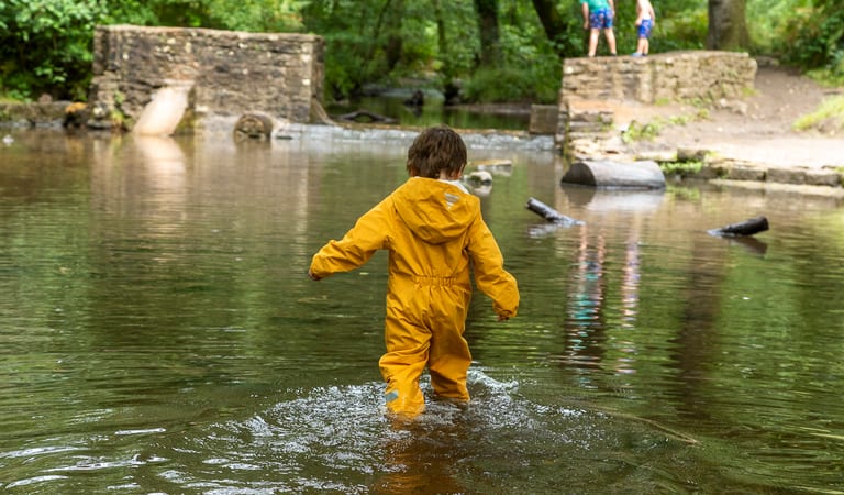 Child playing in the water at Wenchford