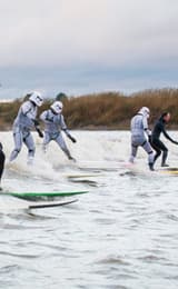 The Severn Bore with Stormtroopers from Star Wars surfing