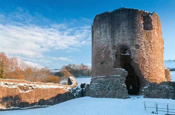 Skenfrith Castle in the winter with Snow