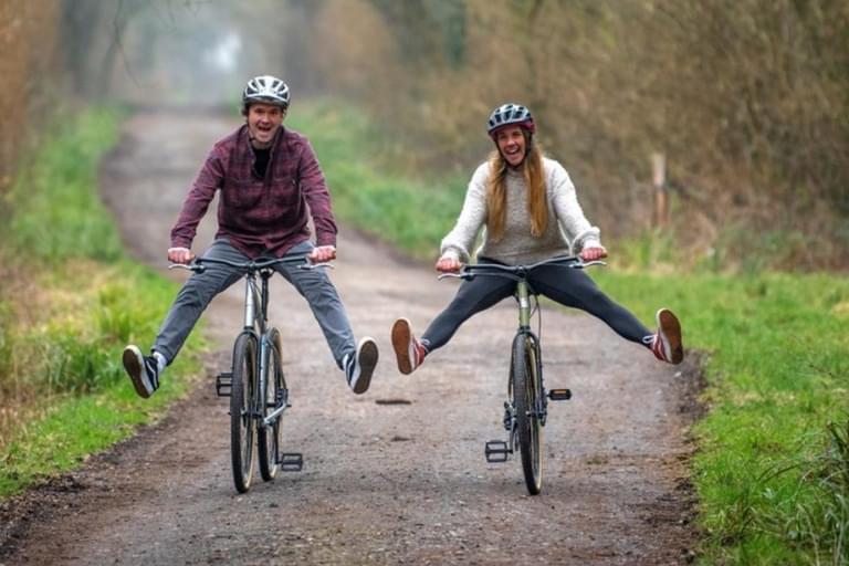 A couple cycling through the Forest of Dean from Dean Forest Cycles