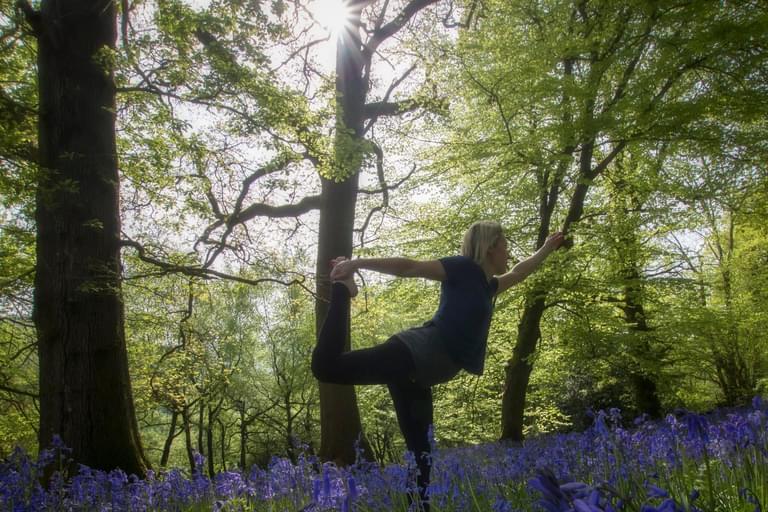 Yoga in a field of bluebells
